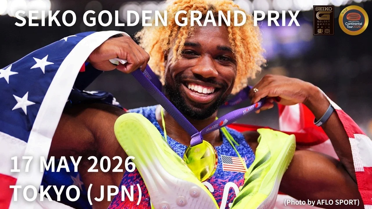 メダルを獲得しアメリカ国旗をまとって笑顔を見せるノア・ライルズ選手